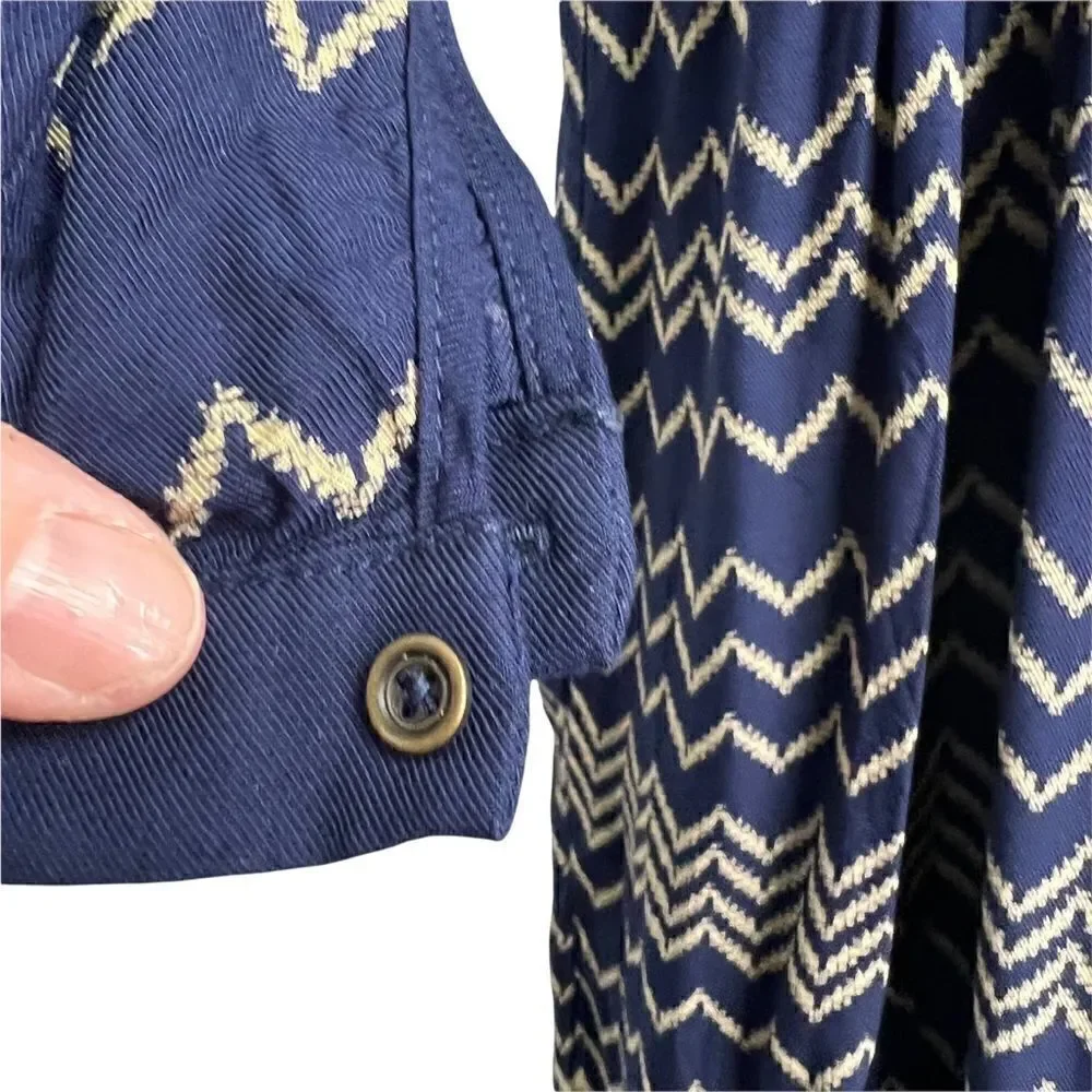 Holding Horses Anthropologie Navy and tan graphic print long sleeve dress